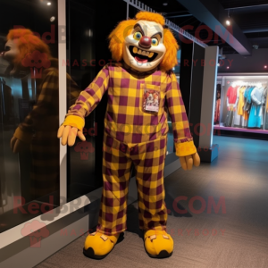 Gold Evil Clown mascot costume character dressed with a Flannel Shirt and Foot pads