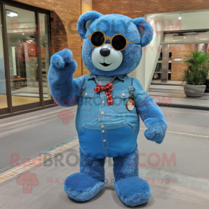 Blue Teddy Bear mascot costume character dressed with a Denim Shirt and Eyeglasses