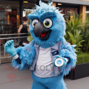 Sky Blue Emu mascot costume character dressed with a Cover-up and Smartwatches