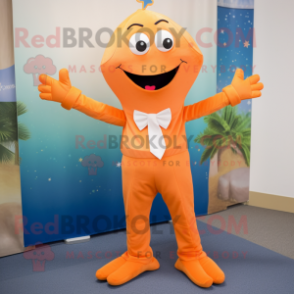 Orange Starfish mascot costume character dressed with a Capri Pants and Cufflinks