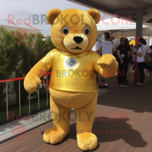 Gold Teddy Bear mascot costume character dressed with a Jeggings and Bracelet watches