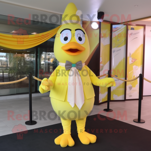 Lemon Yellow Butter Chicken mascot costume character dressed with a Long Sleeve Tee and Bow ties