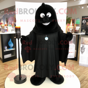 Black Scented Candle mascot costume character dressed with a Trousers and Shawl pins