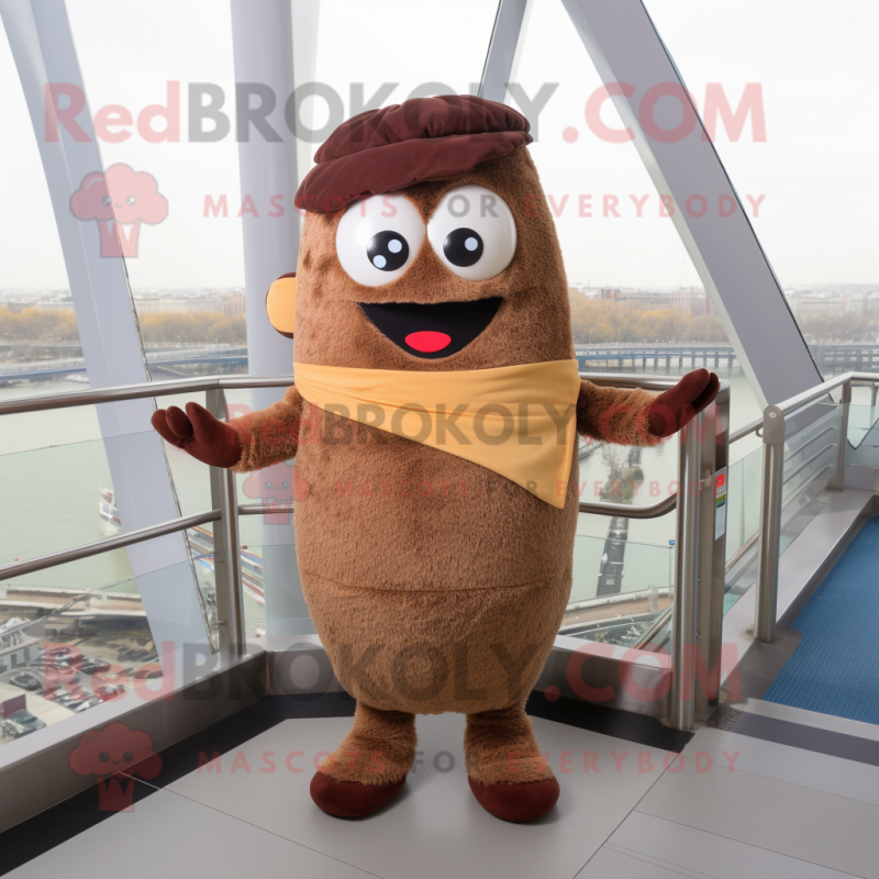 Brown Moussaka mascot costume character dressed with a Overalls and Scarves