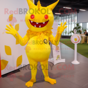 Lemon Yellow Devil mascot costume character dressed with a Blouse and Hairpins