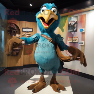 Turquoise Vulture mascot costume character dressed with a Jeans and Belts