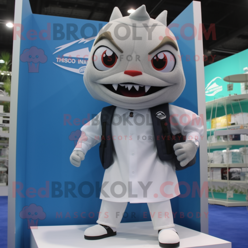 White Tuna mascot costume character dressed with a Polo Tee and Briefcases