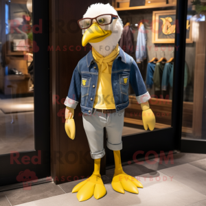 Gold Gull mascot costume character dressed with a Jeans and Ties
