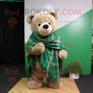 Green Teddy Bear mascot costume character dressed with a Flannel Shirt and Shawls