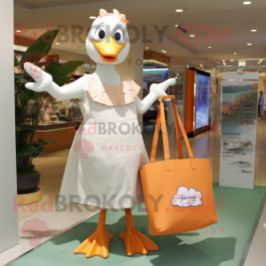 Peach Gull mascot costume character dressed with a Shift Dress and Tote bags