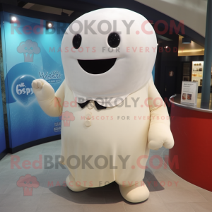 Cream Whale mascot costume character dressed with a Vest and Gloves