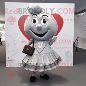 Silver Heart mascot costume character dressed with a Pencil Skirt and Pocket squares