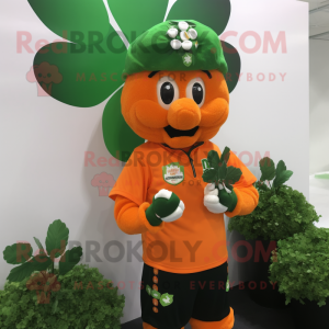 Orange Bunch Of Shamrocks mascot costume character dressed with a T-Shirt and Bracelets