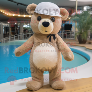 Beige Teddy Bear mascot costume character dressed with a Swimwear and Beanies