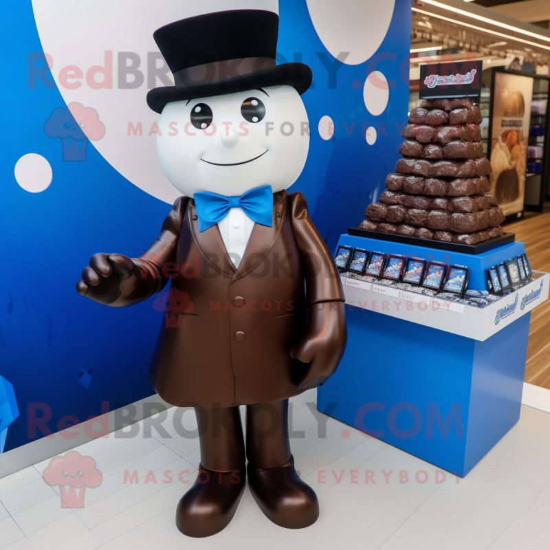 Blue Chocolates mascot costume character dressed with a Tuxedo and Shawls