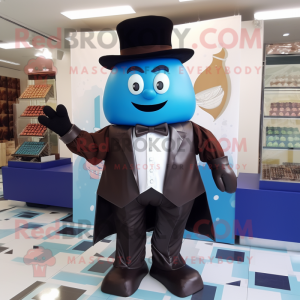 Blue Chocolates mascot costume character dressed with a Tuxedo and Shawls