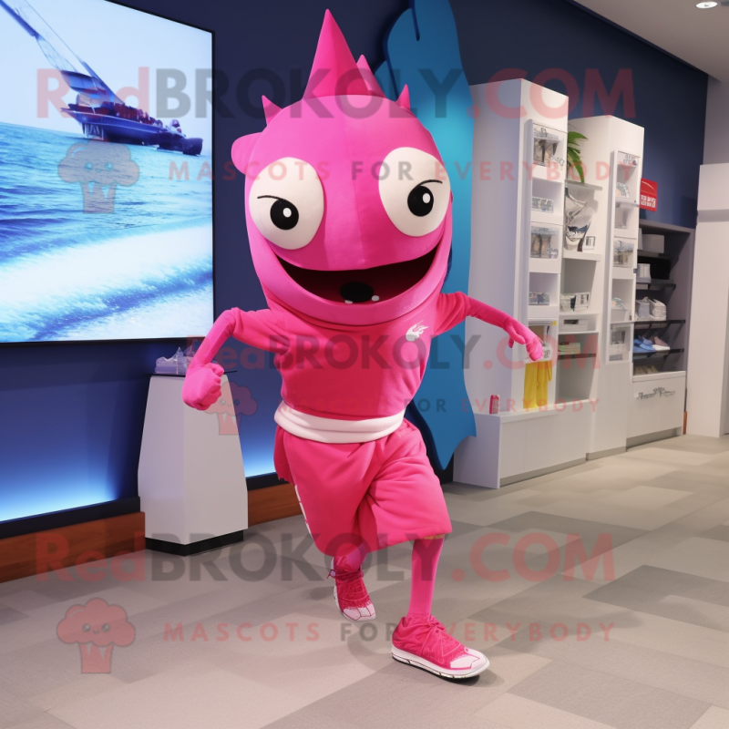 Pink Swordfish mascot costume character dressed with a Running Shorts and Headbands