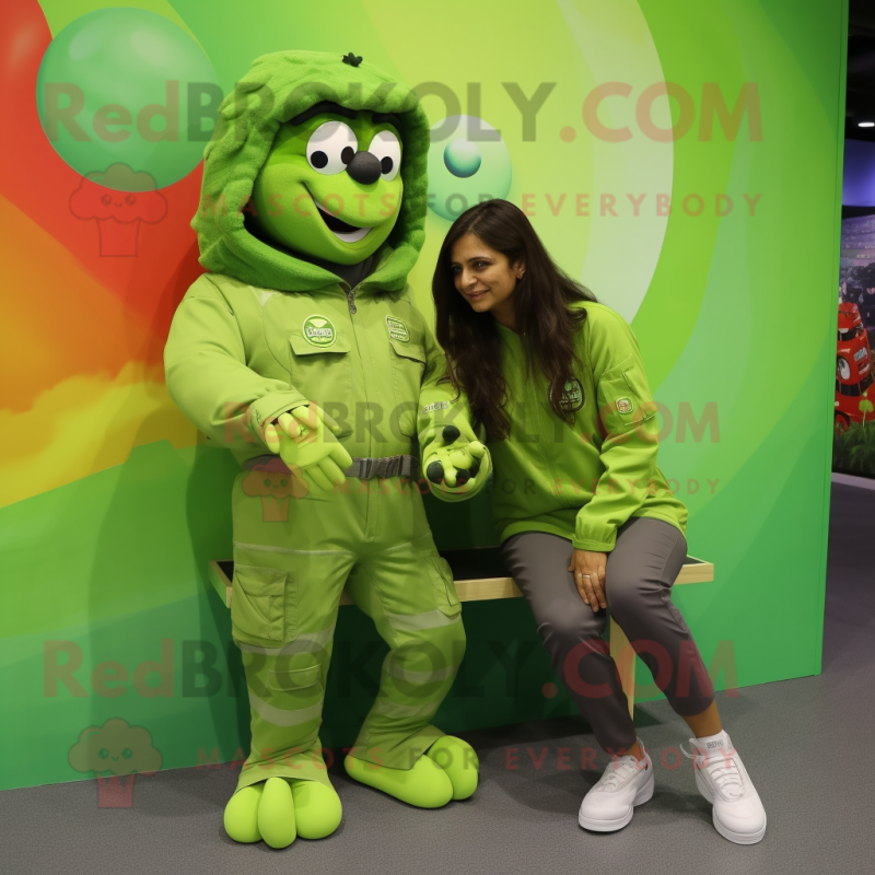 Lime Green Para Commando mascot costume character dressed with a Long Sleeve Tee and Hair clips