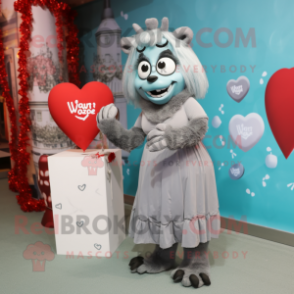 Gray Love Letter mascot costume character dressed with a Maxi Dress and Anklets