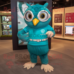 Teal Owl mascot costume character dressed with a Polo Shirt and Watches