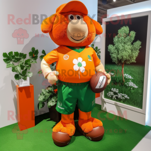 Orange Bunch Of Shamrocks mascot costume character dressed with a Rugby Shirt and Pocket squares
