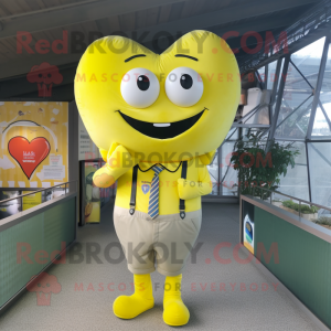 Lemon Yellow Heart mascot costume character dressed with a Oxford Shirt and Wraps