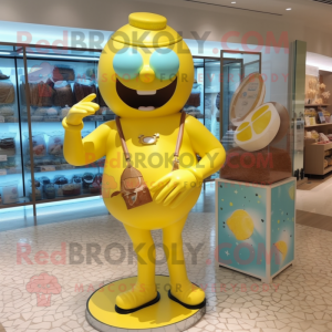 Lemon Yellow Chocolates mascot costume character dressed with a Swimwear and Bracelet watches