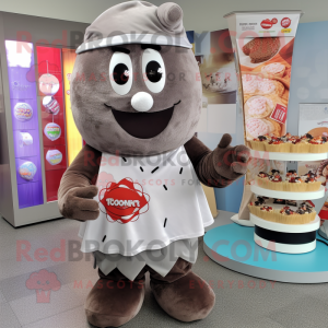 Gray Chocolates mascot costume character dressed with a T-Shirt and Scarves