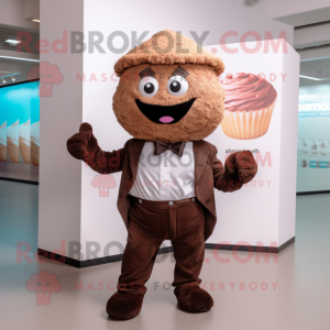 Brown Cupcake mascot costume character dressed with a Waistcoat and Suspenders