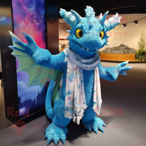 Sky Blue Dragon mascot costume character dressed with a Playsuit and Shawl pins