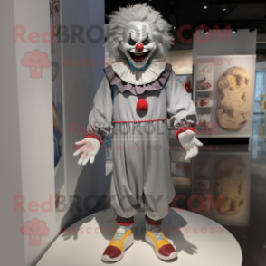 Gray Evil Clown mascot costume character dressed with a Joggers and Shoe laces