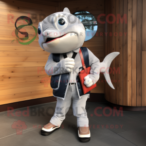 Maroon Salmon mascot costume character dressed with a Capri Pants and Tie  pins