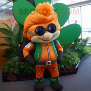 Orange Bunch Of Shamrocks mascot costume character dressed with a Leather Jacket and Backpacks