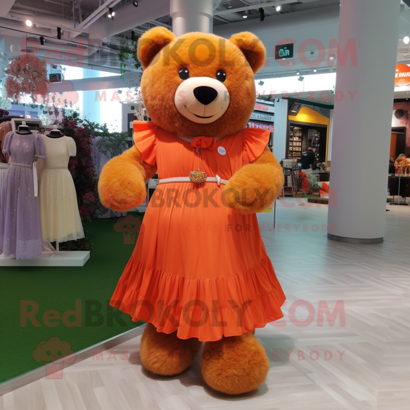 Orange Teddy Bear mascot costume character dressed with a Maxi Dress and Belts