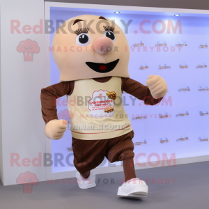 Beige Chocolates mascot costume character dressed with a Running Shorts and Keychains