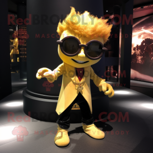 Gold Vampire mascot costume character dressed with a V-Neck Tee and Eyeglasses