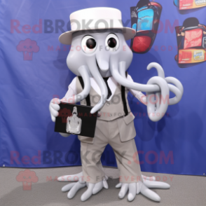 Silver Squid mascot costume character dressed with a Dress Shirt and Wallets