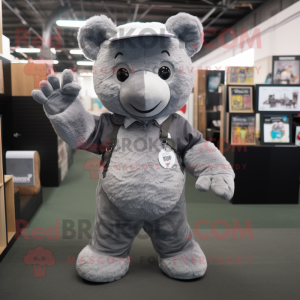 Gray Teddy Bear mascot costume character dressed with a Bootcut Jeans and Pocket squares