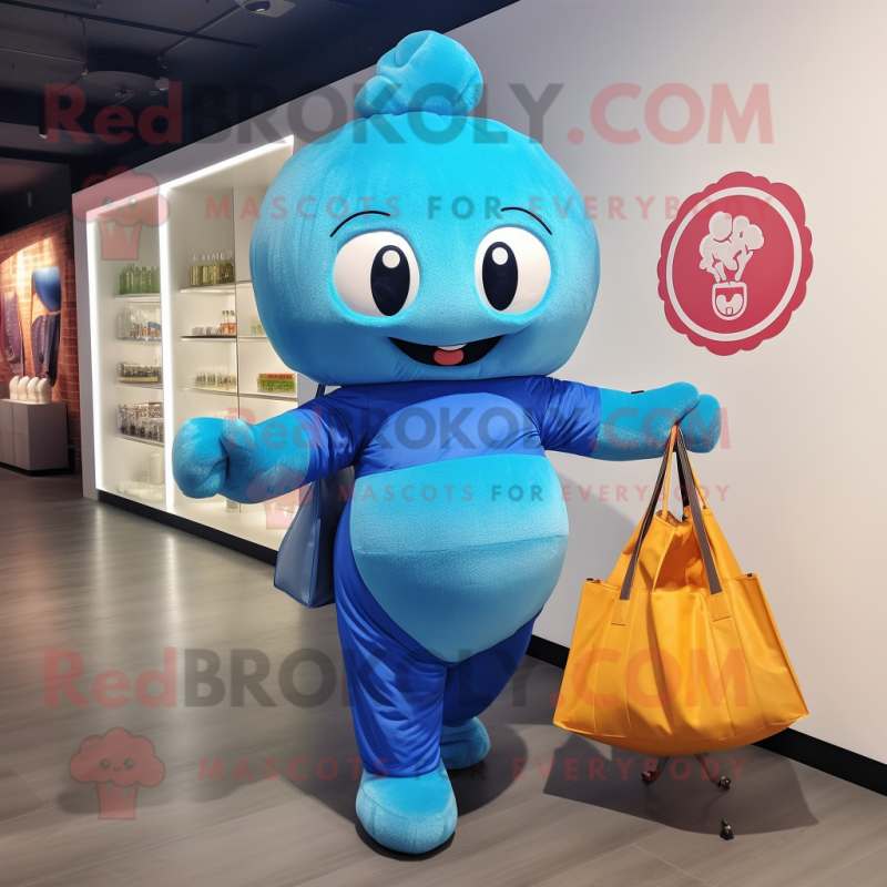 Blue Dim Sum mascot costume character dressed with a Yoga Pants and Tote bags