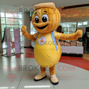 Gold Donut mascot costume character dressed with a Button-Up Shirt and Tote bags