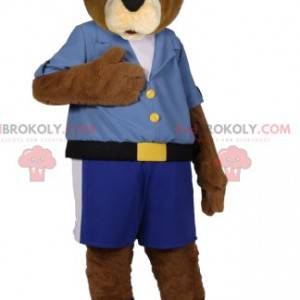 Brun bjørnemaskot i blå shorts og skjorte - Redbrokoly.com