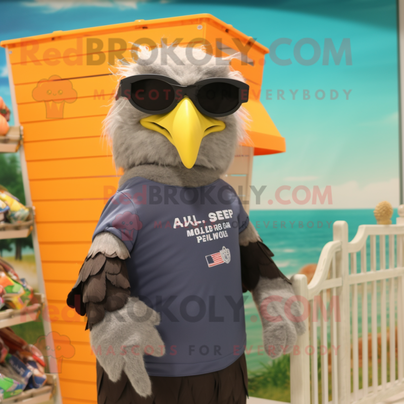 Gray Bald Eagle mascot costume character dressed with a Swimwear and Eyeglasses