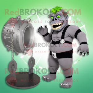 Gray Frankenstein'S Monster mascot costume character dressed with a One-Piece Swimsuit and Rings