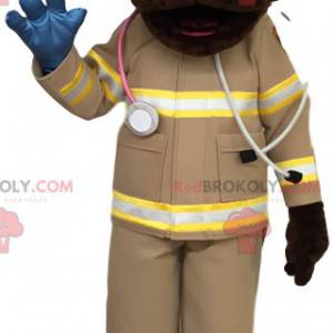 Mascotte de labrador marron en tenue de secouriste -