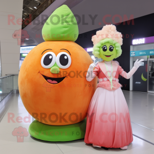 Peach Falafel mascot costume character dressed with a Evening Gown and Smartwatches