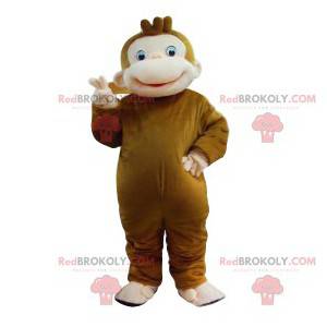 Brun abe maskot med et stort smil - Redbrokoly.com