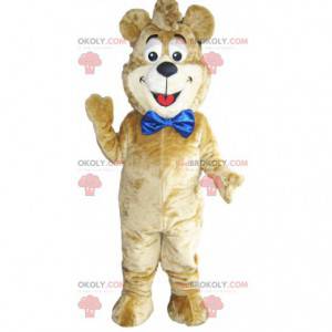 Beige beer mascotte met een grote blauwe strik. Beer kostuum -