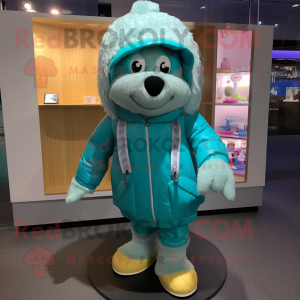 Teal Candy Box mascot costume character dressed with a Parka and Ties