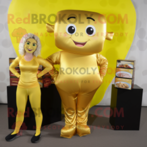 Gold Candy Box mascot costume character dressed with a Yoga Pants and Wallets