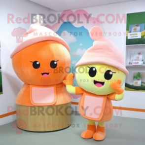 Peach Candy Box mascot costume character dressed with a Wrap Skirt and Beanies